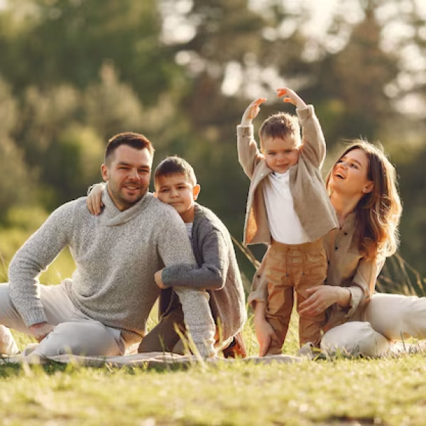 cute-family-playing-summer-field_1157-37659